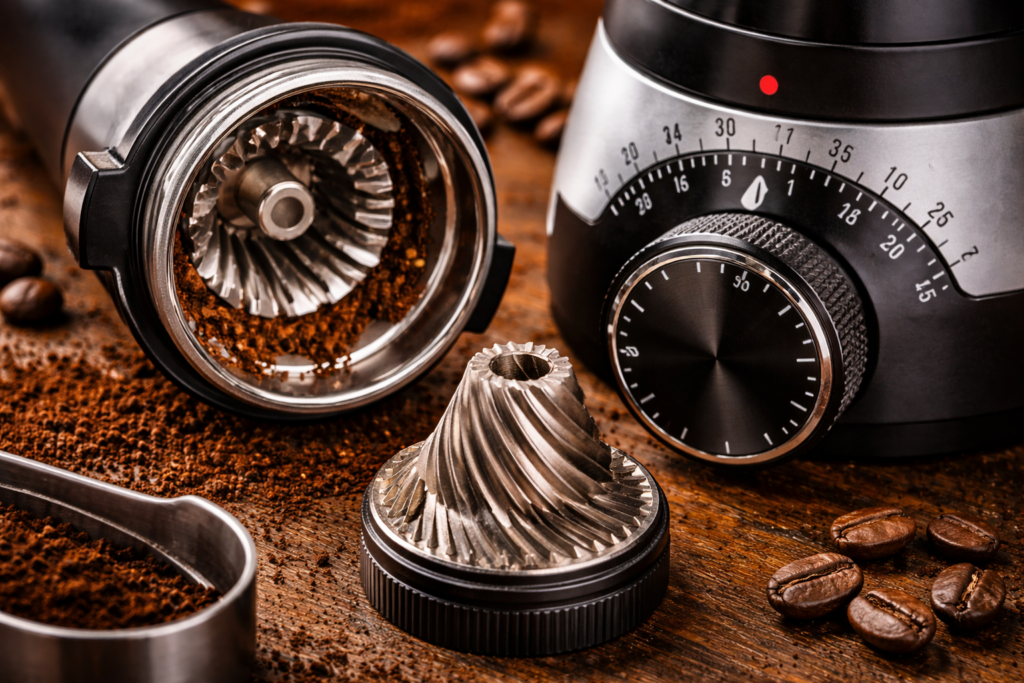 Grind Size Explained: The Complete Guide to Coffee Grind for Better Flavor (Espresso, Drip, Pour-Over & More) 11 Burr grinder components showing conical burrs and grind adjustment